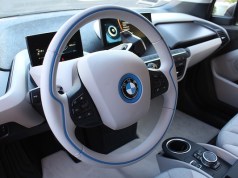 Electric Vehicle Charging: A Sustainable Solution For Transportation BMW car driving wheel